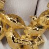 Monet Green and Clear Rhinestone Open Heart Brooch in Gold Tone