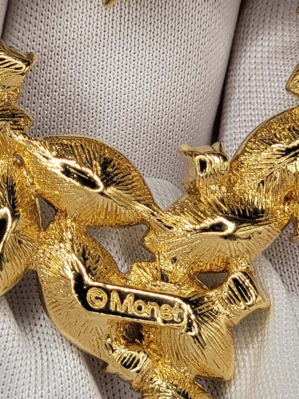 Monet Green and Clear Rhinestone Open Heart Brooch in Gold Tone
