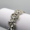 BRA-00010 (4) Weiss Clear Glass Rhinestone Bow Link Bracelet in Silver Tone
