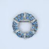 BRO-00001 (13) Light Blue Rhinestone Wreath Brooch | Silver Tone
