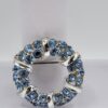BRO-00001 (7) Light Blue Rhinestone Wreath Brooch | Silver Tone