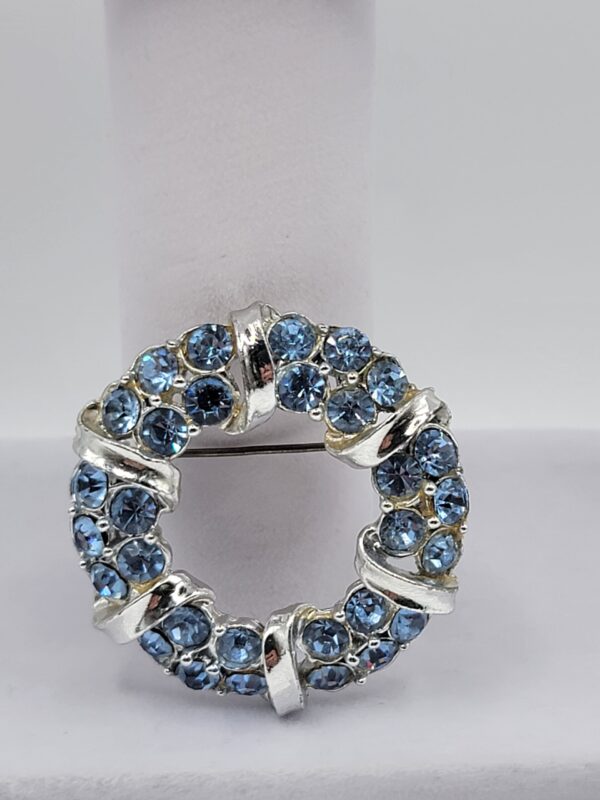 BRO-00001 (7) Light Blue Rhinestone Wreath Brooch | Silver Tone