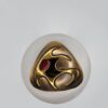 Hogan-Bolas Abstract Gold-Tone Triangle Brooch with Red Accent